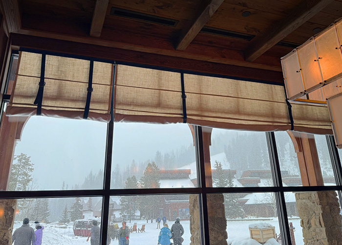 Hand-crafted window treatment over a large window pane for the Big Sky Resort restaurant M