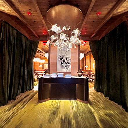 Big Sky Resort restaurant M main entrance and waiting area with a host desk