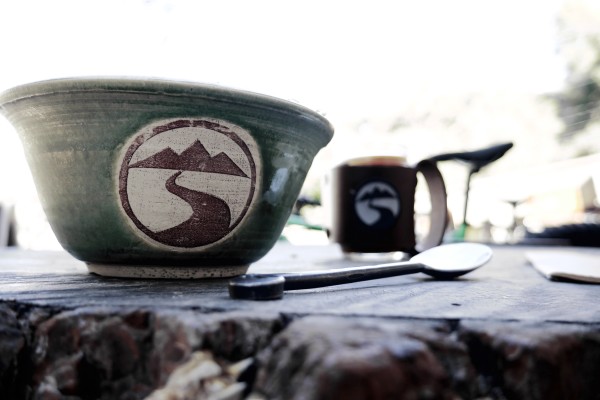 Rebecca makes the mugs and bowls for the Outpost.