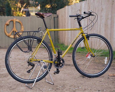 Horace's mustard Surly Cross Check has a beautiful brown B-17 saddle and Surly Nice Rack