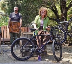 She's all smiles to pick up her new black Disc Trucker