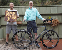 This custom Disc Trucker is ready for great adventures. SON dynamo hub, fenders, racks and all.