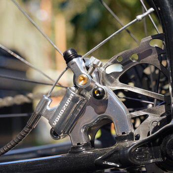 Yokozuna Motoko cable-actuated hydraulic disc brake provides great stopping power when Connor needs it