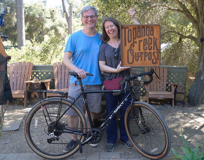 This couple is all grins taking home with them a  beautiful Surly Midnight Special