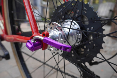 Jeo's full custom Surly Pacer with purple Paul Component thru-axle quick release