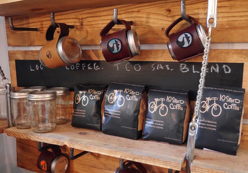 Locally roasted 10 Speed Coffee and our own coffee mug made out of leather and mason jar