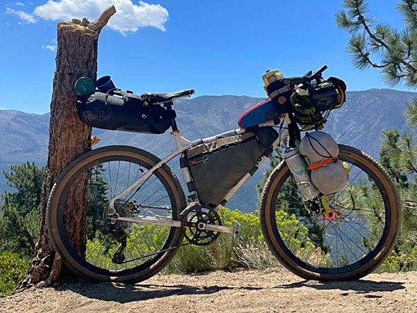 Bicycle loaded with gear ready for bikepacking