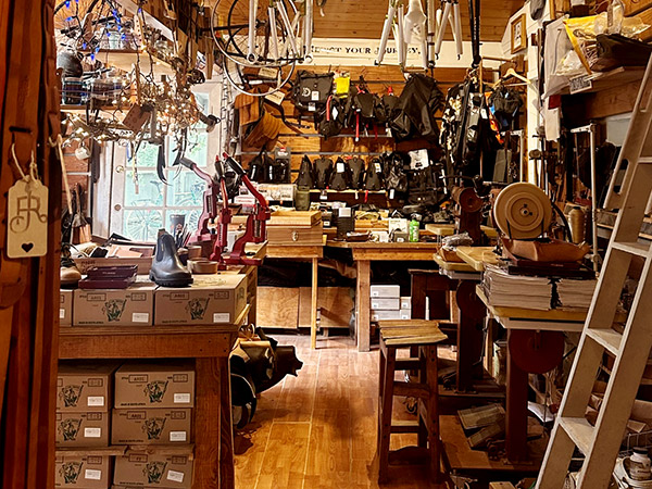 Shop main room with wooden furnishings and lots of merchandise