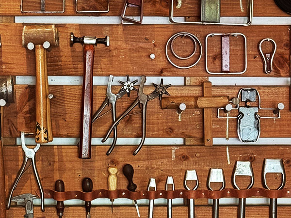 A wall of leathercrafting hand tools