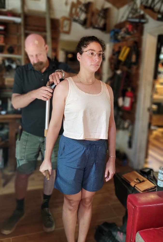 Person's arm being measured during bicycle fitting