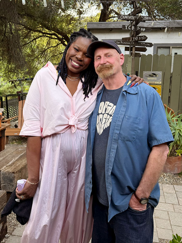 HGTV's Roast My Rental host Leslie Jones posing with Topanga Creek Outpost's Chris Kelly