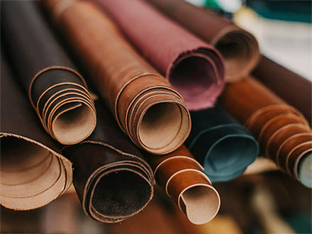 Rolls of leather hides stacked on top of each other