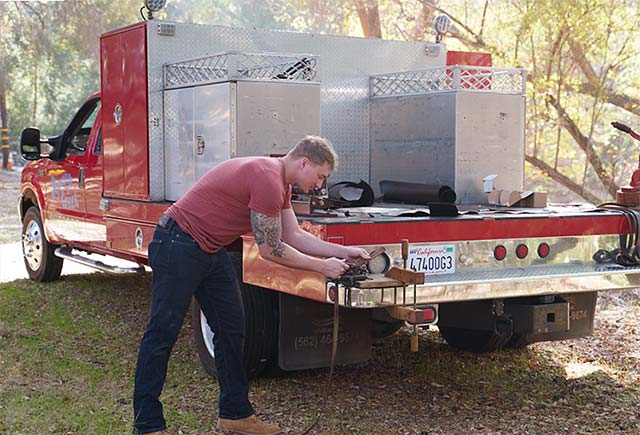 Belt making in the back of the fire truck