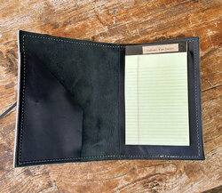 Inside the journal cover, there's a pocket to hold small things