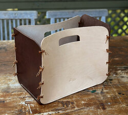 Leather storage container with knotted leather lace