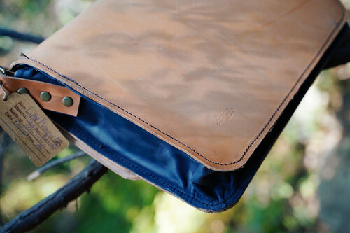 Rogue Journeymen messenger bag in veg tan with blue accents
