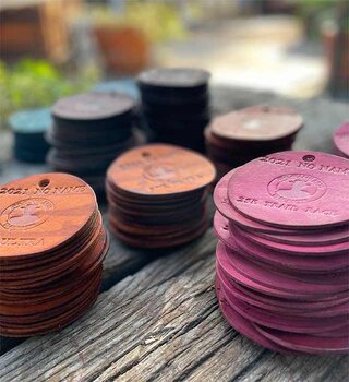 Leather coasters made at the Belt Brigade