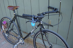 A nice looking Surly Cross Check in black with brown Brooks B-17 saddle