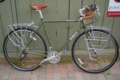 A beautiful Surly Long Haul Trucker with Brooks B17 saddle, Brooks bar tape and a set of Surly Nice Racks