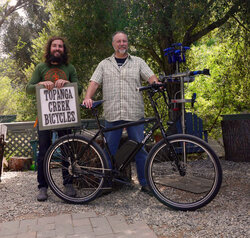 This all custom Ogre has a motor assist, generator hub and more. Amazing bike for John.