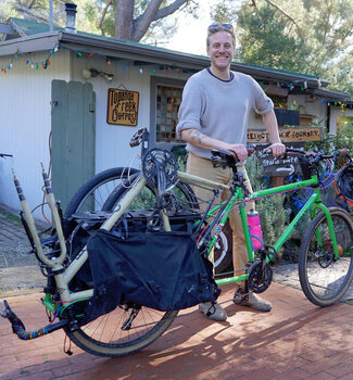 Simon shows up on his Surly Big Dummy to drop another bike off. Love it.