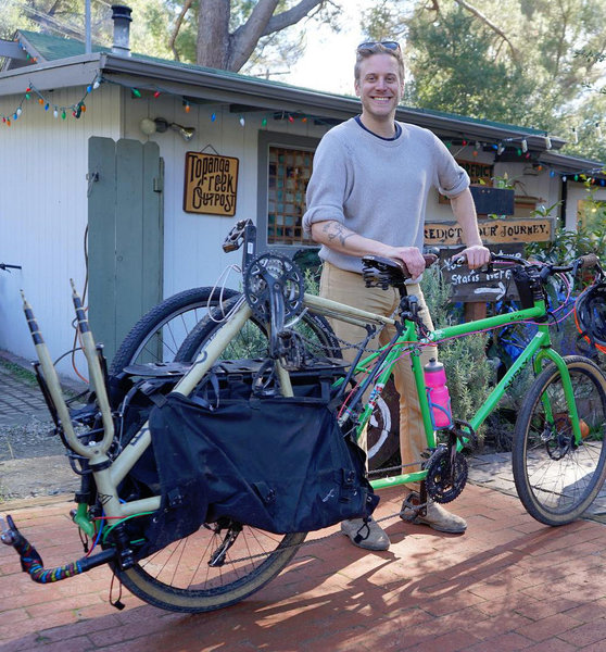 Simon shows up on his Surly Big Dummy to drop another bike off. Love it.