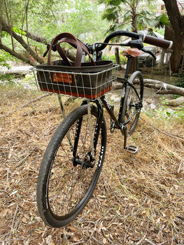 Surly Bridge Club with a custom handlebar, front wired basket, and TCO's canvas bag