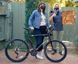 Kristin is all smiles behind the mask to pick up her new Disc Trucker