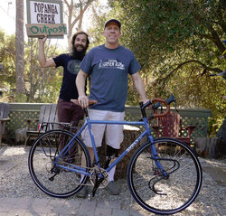 Michael's new Surly Disc Trucker has Brooks B17/bar tape and Schmidt Dynamo hub