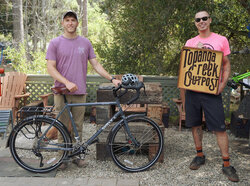 With a beautiful Brooks saddle, a rear rack and fenders, this is a very classy Disc Trucker for Seth.