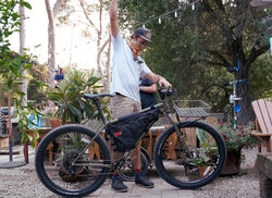 John's Karate Monkey is outfitted with a frame bag and a front basket. Rad!