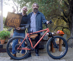 Surly Karate Monkey in Peach Salmon Sundae accessorized with our TCO leather bag