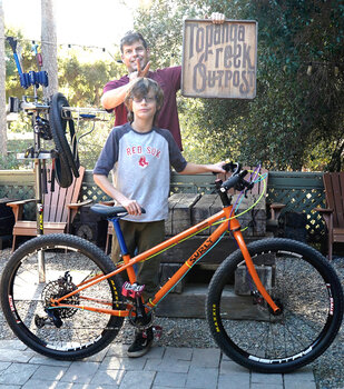 Jax is ready to take his new Surly Lowside to the neighborhood pump track