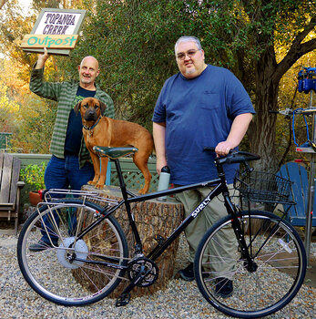 David's custom Surly Ogre has a unique FlyKly pedal assisted rear wheel and titanium railed Brooks B17