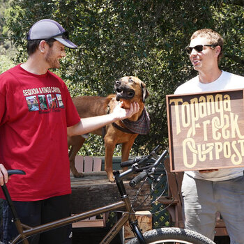 Surly Ogre is such a great bikepacking bike. Here's Mike picking up his new Ogre as Rover looks on.