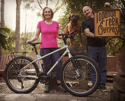 Maria's versatile Surly Troll fits her perfectly and will provide years of great riding