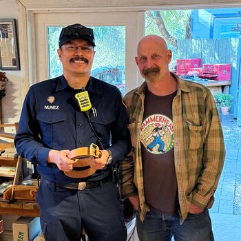 A first responder receives a free belt from us. We use premium top grain leather for all of our belts.