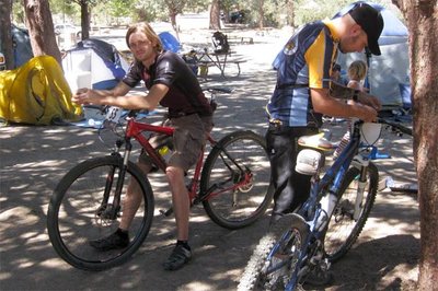 Errin on his Pivot getting ready while Danny looks on for the 24 Hours of Adrenalin Race in Hurkey Creek