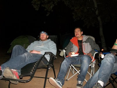 Capt. Penguin and Jeovanni relaxing by the campfire