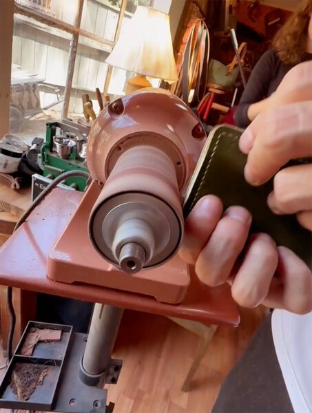 Customer burnishing the edge of the wallet to produce a very smooth edge